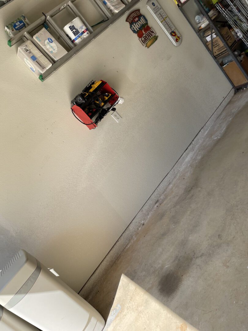 Organized garage with shelves and tools.